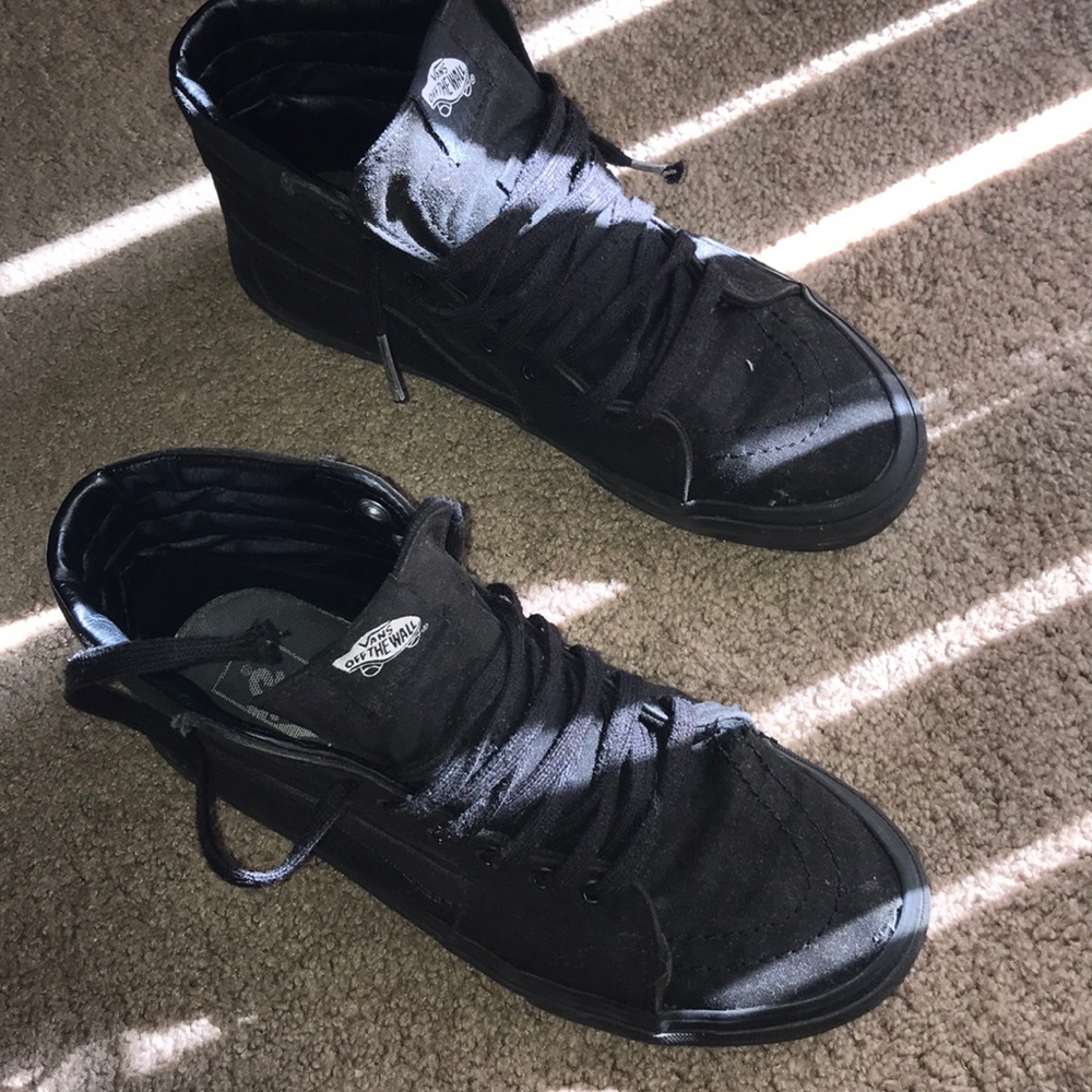 All black high top vans